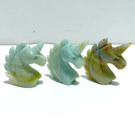 39 Pieces Small Caribbean Calcite Unicorn Carving - Wholesale Crystals