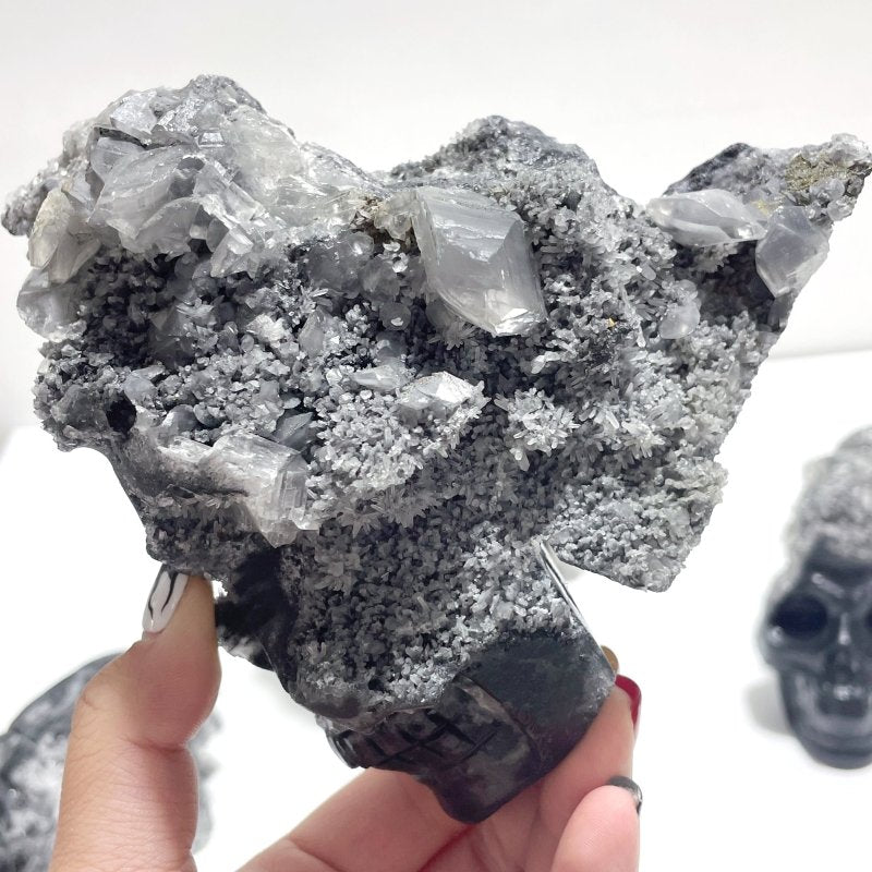 4 Pieces Black Clear Quartz Cluster Skull Carving - Wholesale Crystals