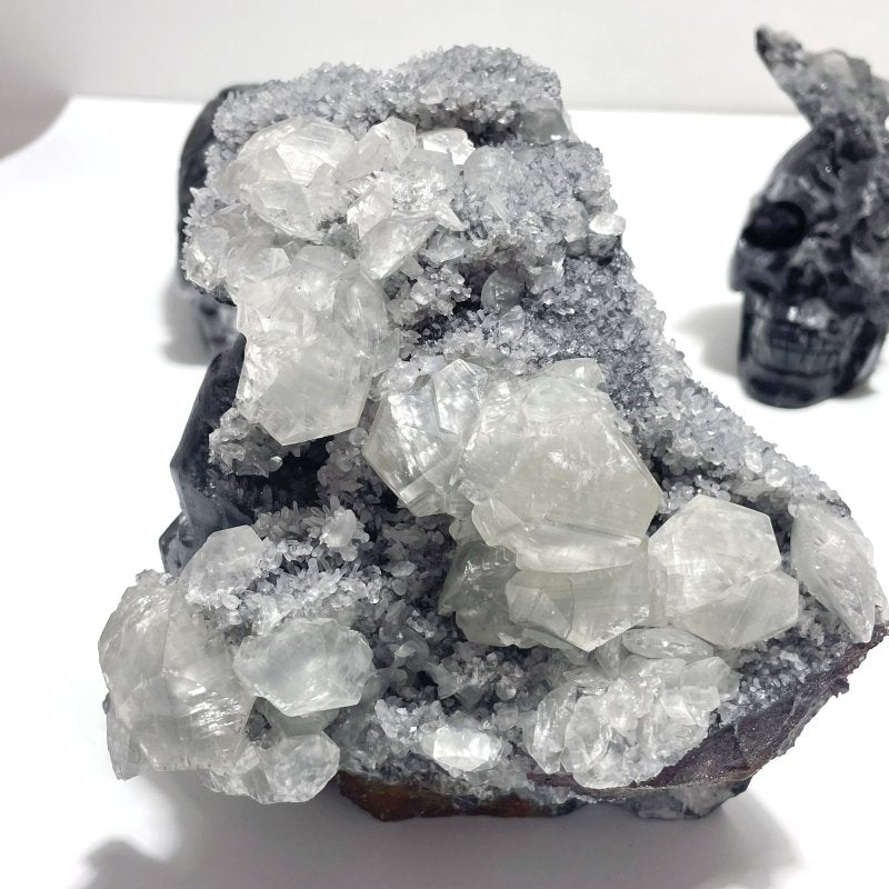 4 Pieces Black Clear Quartz Cluster Skull Carving - Wholesale Crystals